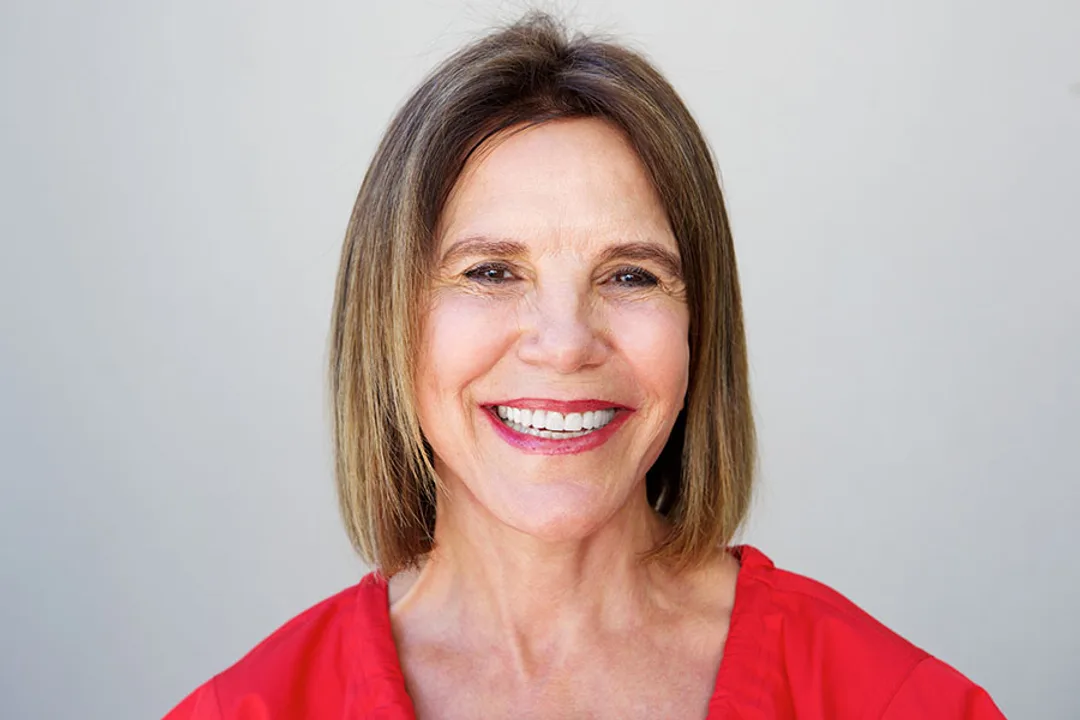Patient smiling after cosmetic dental treatment